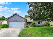 Charming single-story home featuring a two-car garage and well-maintained landscaping at 926 Brookside Ln, Plainfield, IN 46168