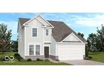 Charming two-story home with a two car garage, a manicured lawn, and light blue siding at 1961 Black Oak Dr, Shelbyville, IN 46176