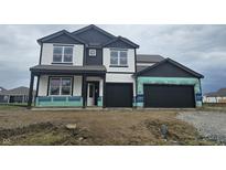 New two-story home featuring a black roof, white siding and black trim, plus an attached two car garage at 2271 Oakmont Dr, Plainfield, IN 46168