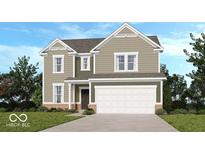 This is a charming two-story home with a two car garage, a combination of brick and vinyl siding, and manicured lawn at 438 Weaver Ln, Pittsboro, IN 46167