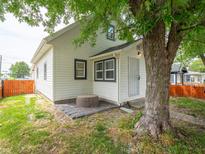 Charming home exterior features new white siding and well-maintained landscaping at 2528 S Pennsylvania St, Indianapolis, IN 46225