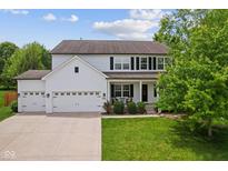 Charming two-story home featuring a three-car garage and a well-maintained lawn at 4681 Shelby Cir, Greenwood, IN 46143