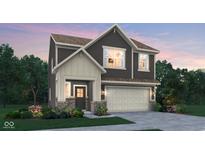 Charming two-story home with gray siding, a covered porch, and a two-car garage at 19812 Moorpark Lndg, Noblesville, IN 46062