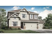Charming two-story home featuring a three-car garage and a beautifully landscaped front yard at 7664 Allesley Dr, Avon, IN 46123