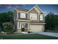 Beautiful two-story home featuring a two-car garage, a covered entryway, and manicured landscaping at 918 Norfolk Ln, Greenwood, IN 46143