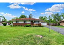 Charming single-story home with a well-maintained lawn and inviting front entrance at 5349 Culver St, Indianapolis, IN 46226