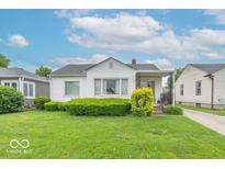 Charming single-story home with manicured front yard and beautiful curb appeal at 445 N 13Th Ave, Beech Grove, IN 46107
