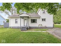 Charming home featuring a well-maintained front yard and a welcoming entrance at 3409 S Rural St, Indianapolis, IN 46237