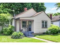 Charming single-story home with a cozy front porch and well-maintained landscaping, perfect for a starter home at 1331 N Berwick Ave, Indianapolis, IN 46222