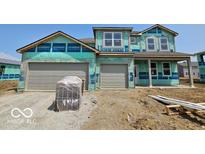 New two-story home featuring a two-car garage with a modern architectural design undergoing final construction at 6032 Granby Dr, Whitestown, IN 46075