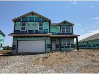 Two-story home featuring an attached two-car garage, white trim windows, and green weather resistant barrier at 61 Benfield Dr, Whiteland, IN 46184