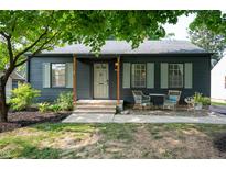 Charming home with a covered porch and beautiful landscaping, offering great curb appeal at 2715 Northview Ave, Indianapolis, IN 46220