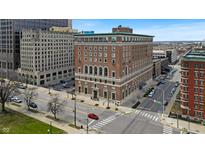Brick building exterior view showing architecture and surrounding streetscape with crosswalks at 350 N Meridian St # 705, Indianapolis, IN 46204