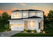 Charming two-story home featuring a two-car garage and stone accents at 6761 Seabiscuit Rd, Whitestown, IN 46075