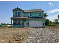 Two-story home featuring large windows and a two-car garage in the exterior elevation under construction at 71 Benfield Dr, Whiteland, IN 46184