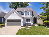 Charming two-story home with well-maintained lawn, updated windows and inviting curb appeal at 241 Chamberlain Cir, Noblesville, IN 46062