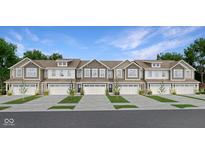 New construction townhomes featuring three-car garages, multiple stories, and neutral colors at 15219 Farrington Way, Fishers, IN 46037