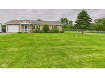 Ranch-style home boasting a well-manicured lawn, inviting curb appeal, and a one-car garage at 3387 S County Road 250 W, Danville, IN 46122