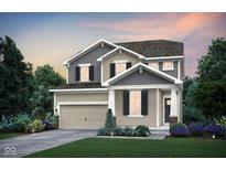 Charming two-story home with landscaped yard, inviting front entrance, and attached two car garage at 569 Dalton Way, Avon, IN 46123