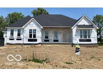 New home construction featuring modern architecture and a dark roof, ready for personalization at 9437 Dogwood Dr, McCordsville, IN 46055