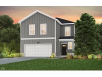 Charming two-story home boasts gray siding, white trim, and a two-car garage with landscaped front yard at 3928 Riverstone Dr, Whitestown, IN 46075