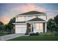 Beautiful two-story home featuring a two-car garage, manicured lawn, and gray horizontal siding at 6857 Jacone Dr, Brownsburg, IN 46112