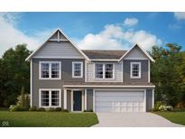 Charming two-story home with gray siding, white trim, and a well-manicured lawn at 741 Oakleaf Dr, Greenfield, IN 46140