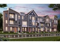 Charming new townhomes feature brick and siding exteriors with well manicured lawns, new construction homes at 7317 Bayview Run, McCordsville, IN 46055