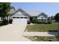 Charming single-Gathering home with a two-car garage and well-maintained front yard at 10628 Bali Ct, Noblesville, IN 46060