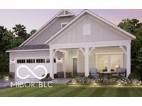 Charming one-story home with a welcoming covered porch and manicured lawn at 16774 Imperial Ct, Fishers, IN 46040