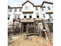 Multi-story house under construction with brick and multiple windows at 7339 Bayview Run, McCordsville, IN 46055