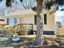 Charming single-story home with a welcoming front porch and classic architectural details at 2523 S Mcclure St, Indianapolis, IN 46241