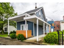 Charming exterior view showcasing the architecture and landscaping of the property at 529 E Merrill St, Indianapolis, IN 46203