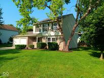 Charming two-story home with brick accents and a well-maintained lawn at 18851 Wimbley Way, Noblesville, IN 46060