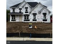 New two-story home construction with black roof, covered in Tyvek wrap and available sign at 1919 Delp Ct, Avon, IN 46123