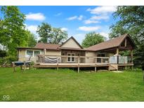 Expansive backyard featuring a large deck perfect for entertaining and outdoor living at 5116 W County Road 450 S, Coatesville, IN 46121