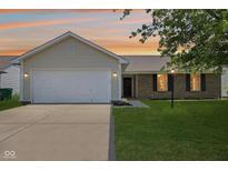 Charming single-story home featuring a brick facade and attached two-car garage at 17357 Austrian Pine Way, Westfield, IN 46074