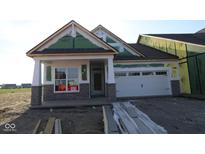 Charming single-story home with stone accents and a two-car garage, still under construction at 3611 Hauser Ct, Bargersville, IN 46106