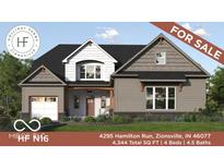 Beautiful new construction home featuring a two-car garage and well-manicured lawn for sale at 4295 Hamilton Run, Zionsville, IN 46077