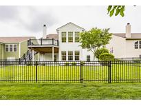A spacious backyard and a large deck make this home perfect for outdoor entertainment at 13091 Duval Dr, Fishers, IN 46037