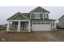 Exterior view of a two story home with white trim and a two car garage at 4055 Bozeman Way, Bargersville, IN 46106