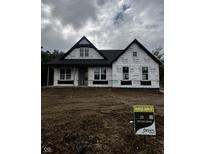 New construction home featuring classic architecture and large windows at 1960 Delp Ct, Avon, IN 46123