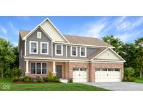 Beautiful two-story home with a brick and gray siding exterior, complemented by a well-maintained front yard and a two car garage at 9078 Drakeswood Ave, McCordsville, IN 46055