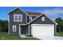 Charming two-story home with dark siding, white trim, and an attached two-car garage at 2086 Rosemont Dr, Columbus, IN 47201