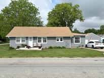 Charming single story home with a well-kept lawn and gray siding at 260 S 250 W, Greenfield, IN 46140
