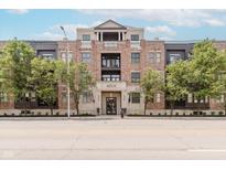 Attractive brick building with manicured landscaping and upscale urban design elements at 355 E Ohio St # 209, Indianapolis, IN 46204
