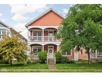 Charming two-story home with front porch, manicured lawn and inviting curb appeal at 2326 N Pennsylvania St # 6, Indianapolis, IN 46205