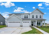 Charming two-story home boasts a three-car garage, well-manicured lawn, and inviting curb appeal at 2733 Bo W St, Plainfield, IN 46168