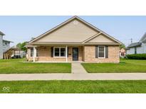 Charming single-story brick home with a well-manicured lawn and inviting front porch at 524 S Meridian S St, Lebanon, IN 46052