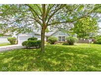 Well-maintained home with green lawn, mature trees and landscaping at 10262 Carmine Dr, Noblesville, IN 46060